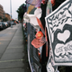 Memorials hang from the front gate of Greenwood Cemetery during an event and procession organized by Naming the Lost Memorials to remember and celebrate the lives of those killed by the covid-19 pandemic on June 8, 2021 in New York City.